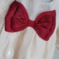 Red bow baby romper